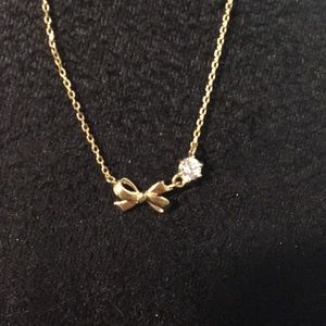Yellow Gold Bow Necklace with Swarovski Zirconia